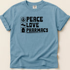 Comfort Colors t-shirt with "Peace Love Pharmacy" text and icons.