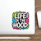 Sticker with colorful text "Life in the Hood" inside cartoon bottle shapes.