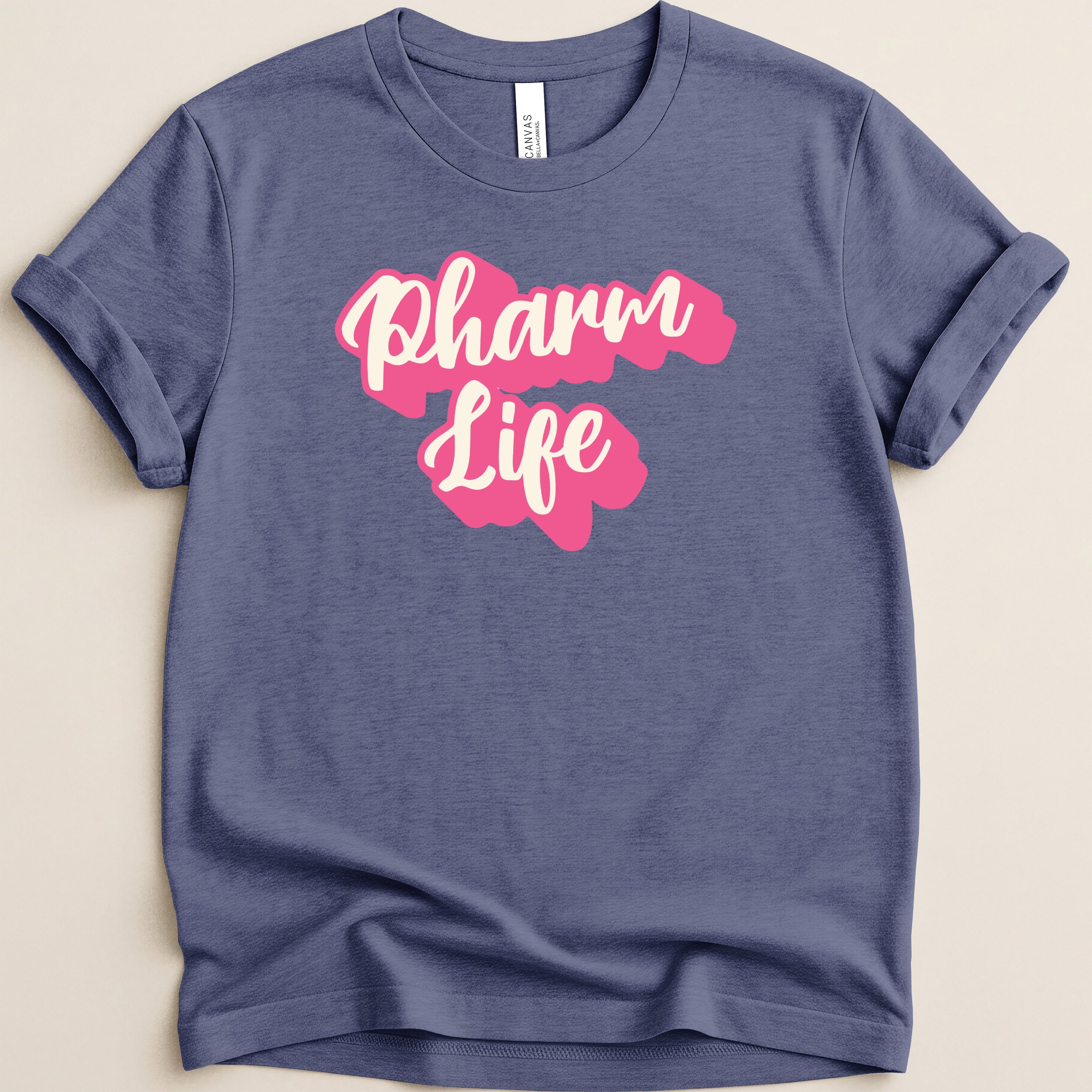 Navy t-shirt with "Pharm Life" in pink script text.