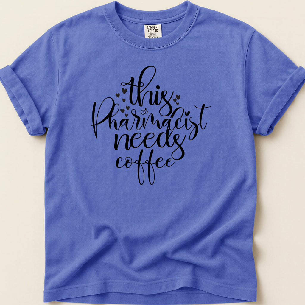 Comfort Colors t-shirt with "This pharmacist needs coffee" text.