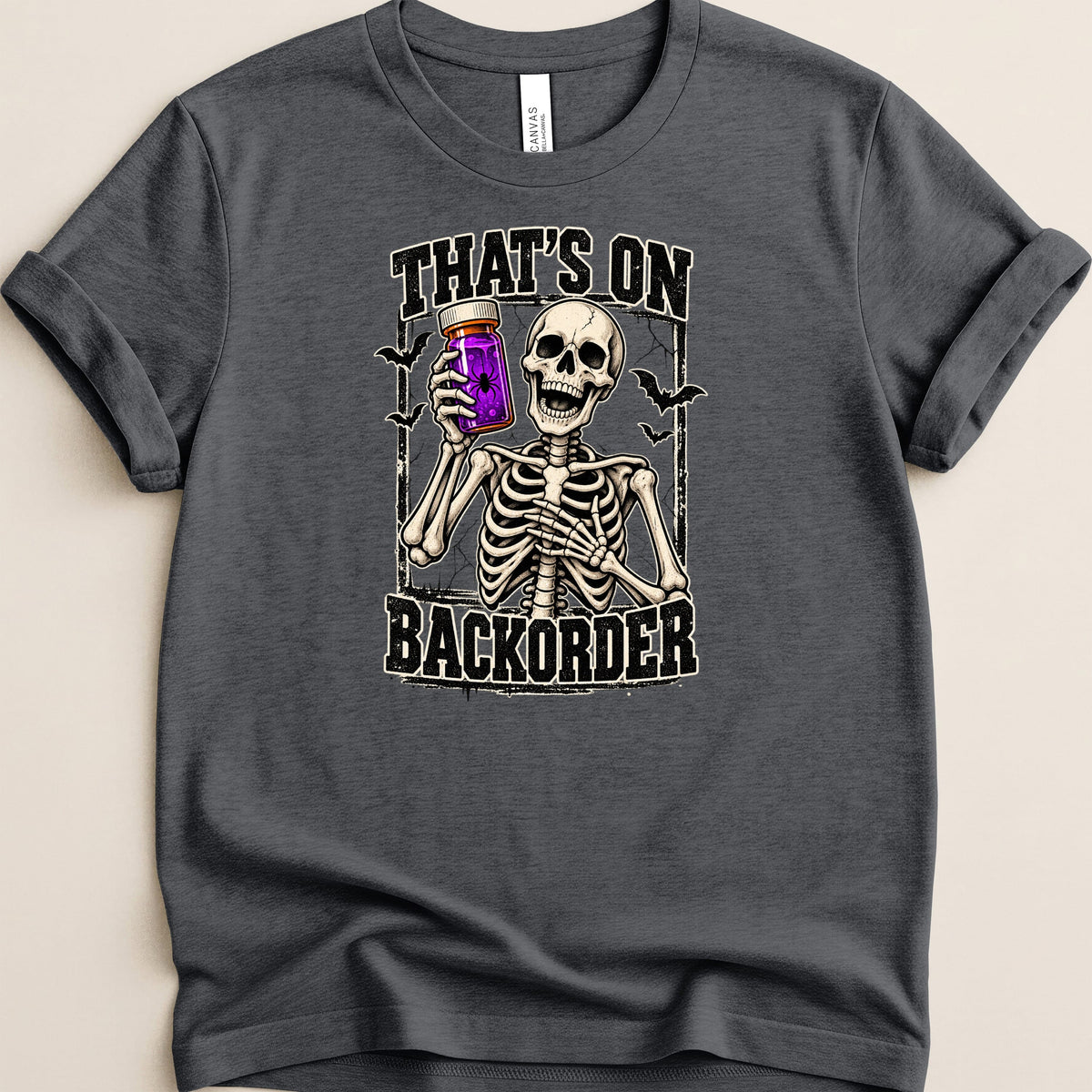Skeleton holding jar with spider, text "That's On Backorder"