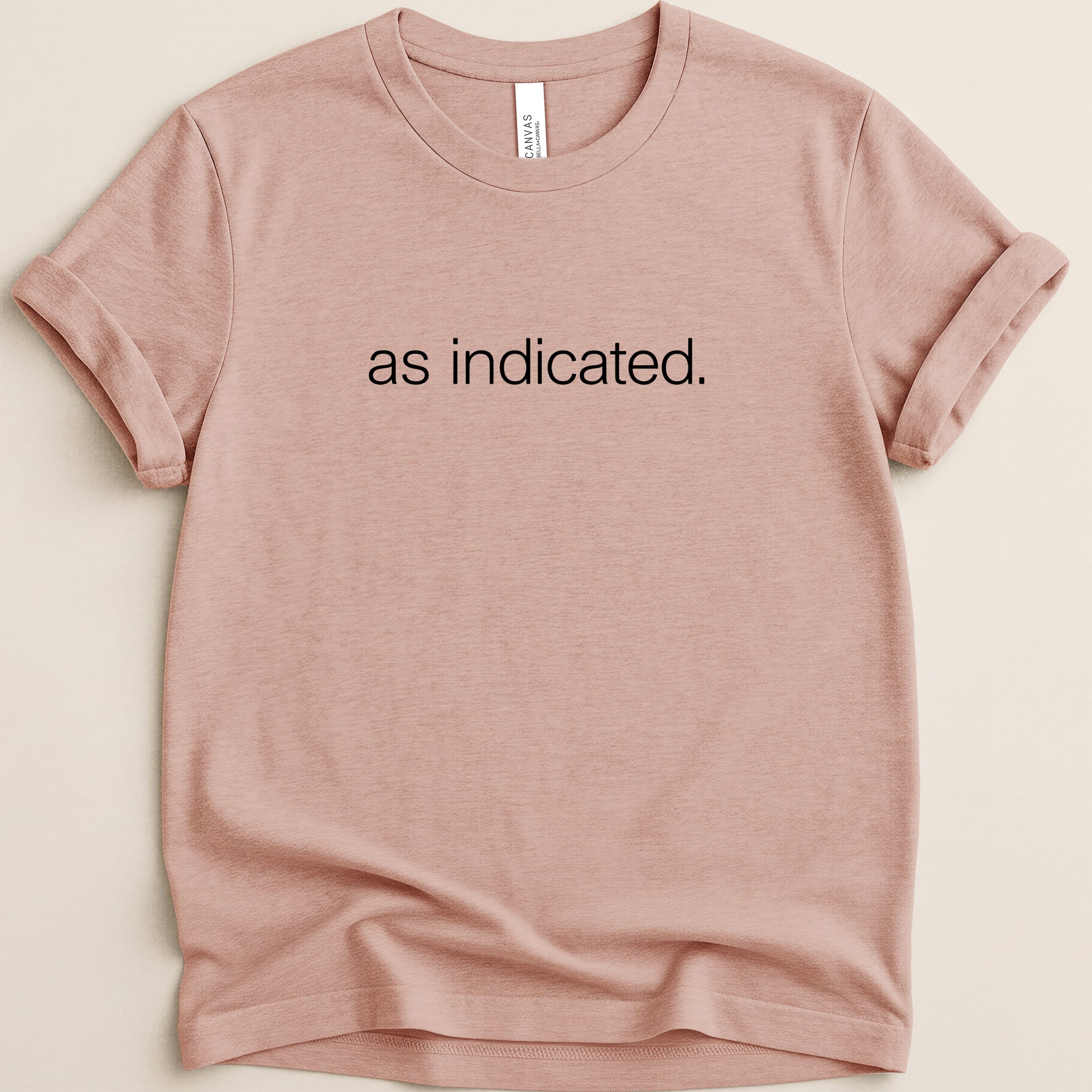 Pink t-shirt with "as indicated." text across the chest.