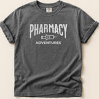 Dark gray t-shirt with "Pharmacy Adventures" graphic.