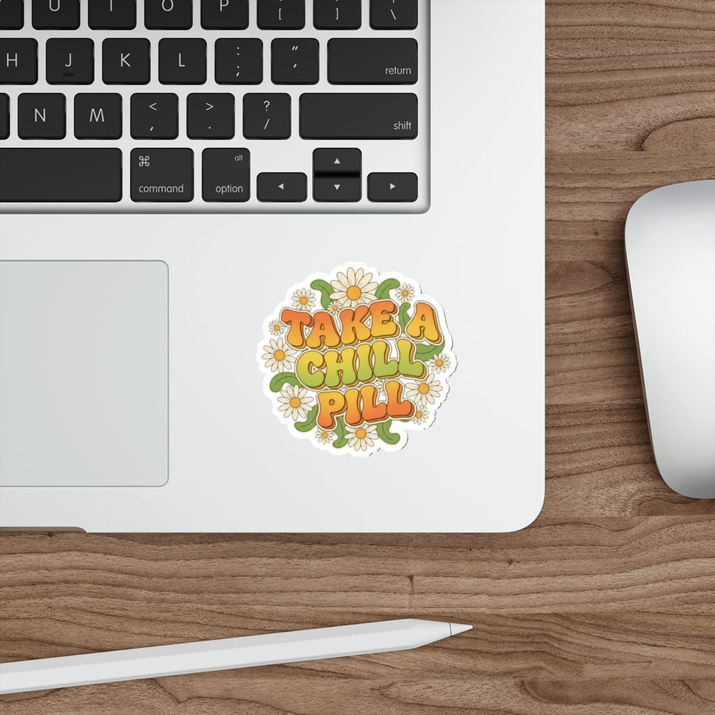 Sticker with "Take a Chill Pill" in colorful lettering surrounded by flowers.