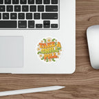 Sticker with "Take a Chill Pill" in colorful lettering surrounded by flowers.