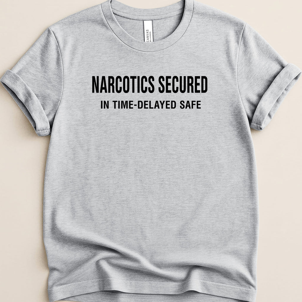 Gray t-shirt with black text "NARCOTICS SECURED IN TIME-DELAYED SAFE".