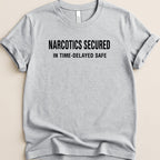 Gray t-shirt with black text "NARCOTICS SECURED IN TIME-DELAYED SAFE".