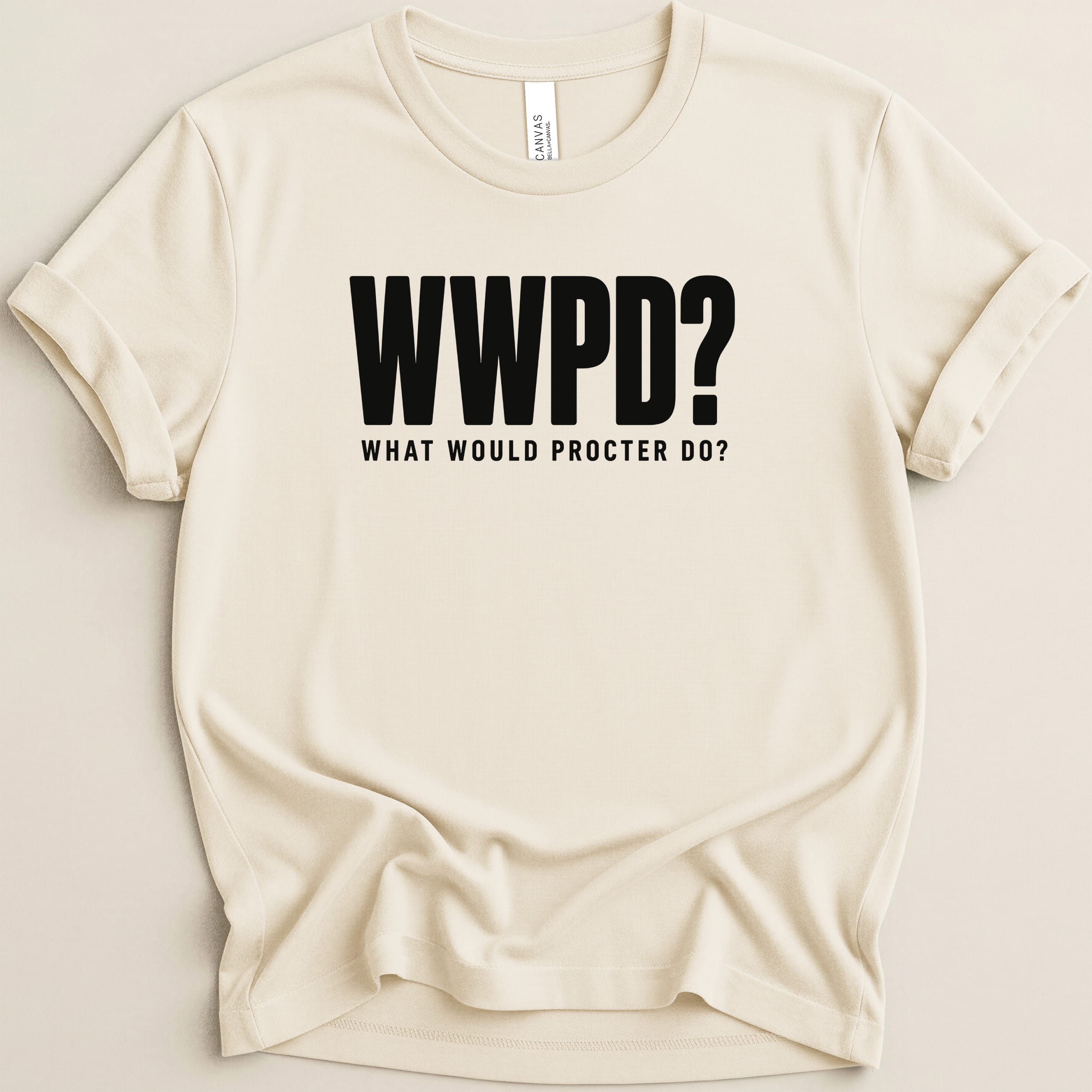 Cream t-shirt with black text "WWPD? WHAT WOULD PROCTER DO?".