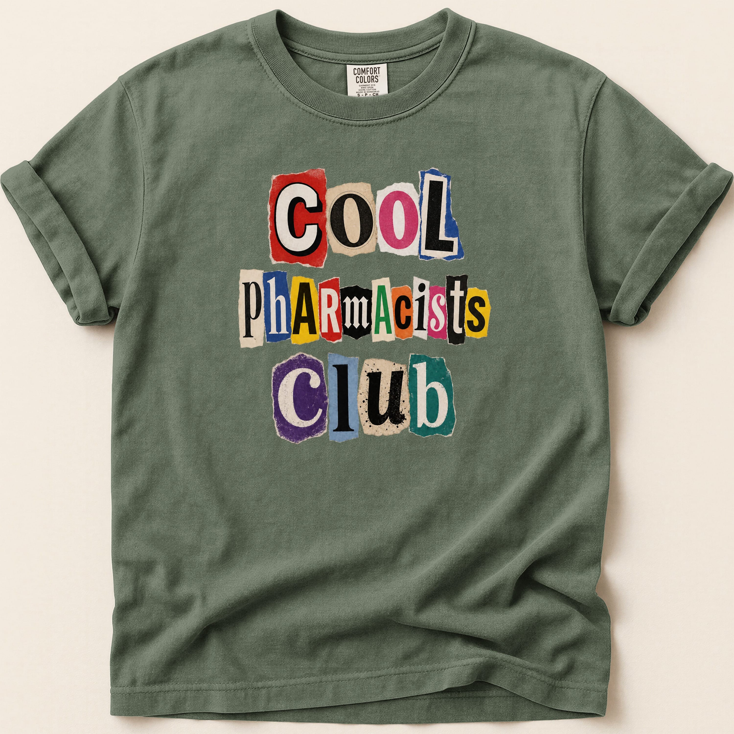 T-shirt with "COOL Pharmacists CLUB" in ransom-note lettering.