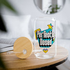 Clear glass can-shaped tumbler with bamboo lid and straw, "Perfectly Dosed" text.