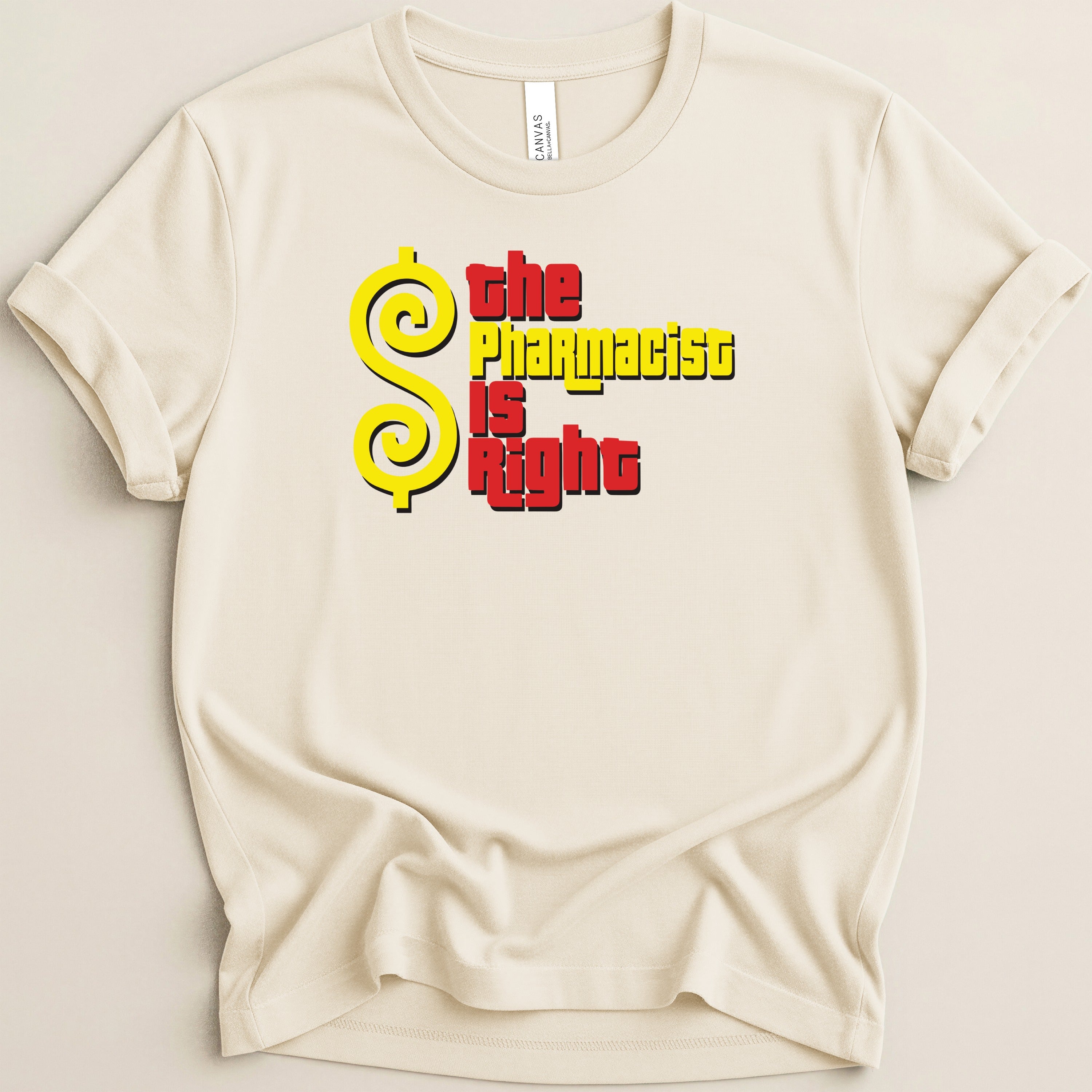 Cream t-shirt with yellow dollar sign and red text reading "the pharmacist is right".