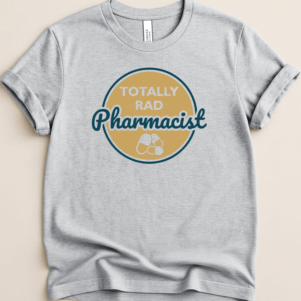 Gray t-shirt with "TOTALLY RAD Pharmacist" text and pill graphic.