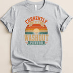 Grey t-shirt with "Currently in my washout period" text and retro sunset graphic.