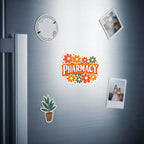 Pharmacy sticker with colorful flowers and leaves on a refrigerator door.