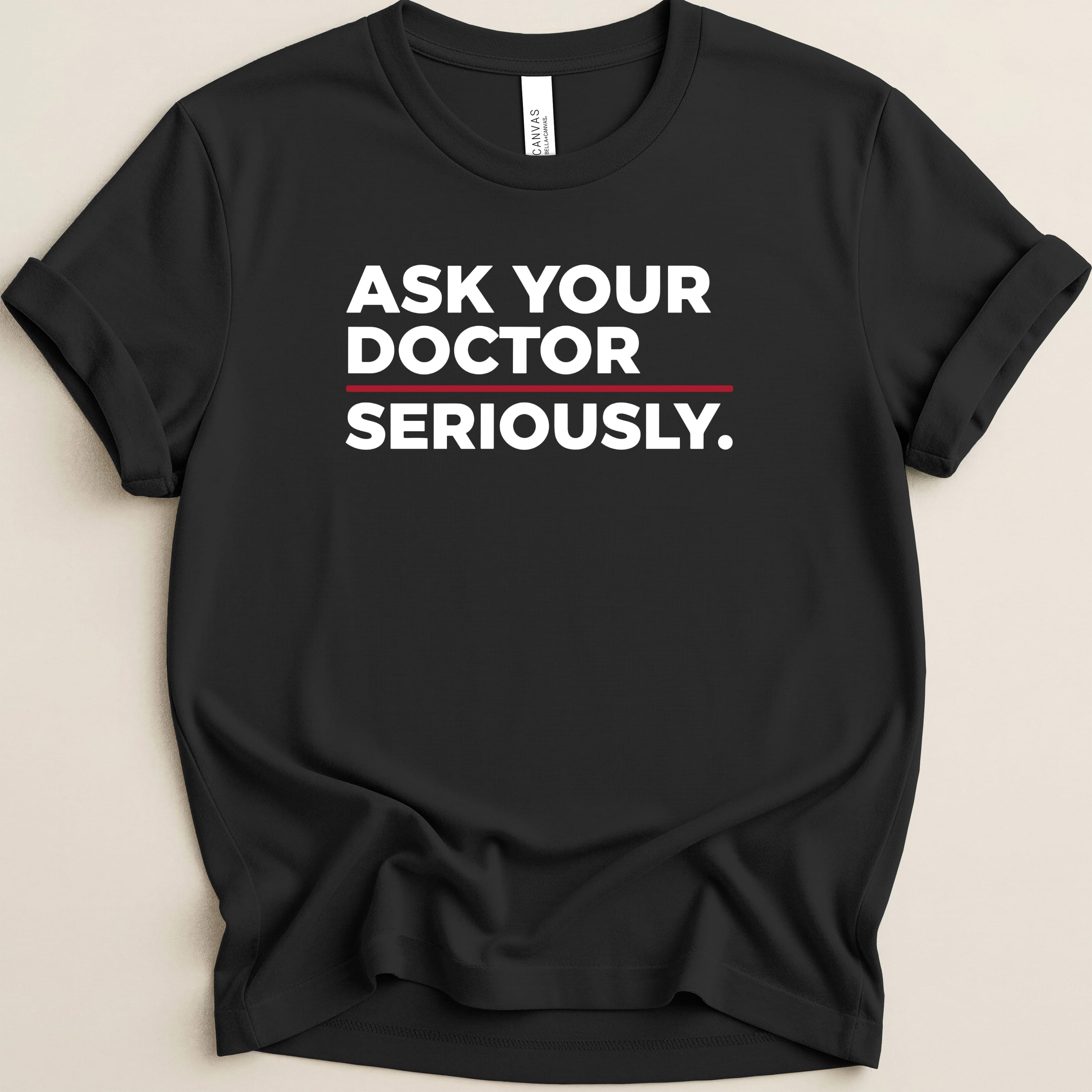 Black t-shirt with "ASK YOUR DOCTOR SERIOUSLY." text in white and red.