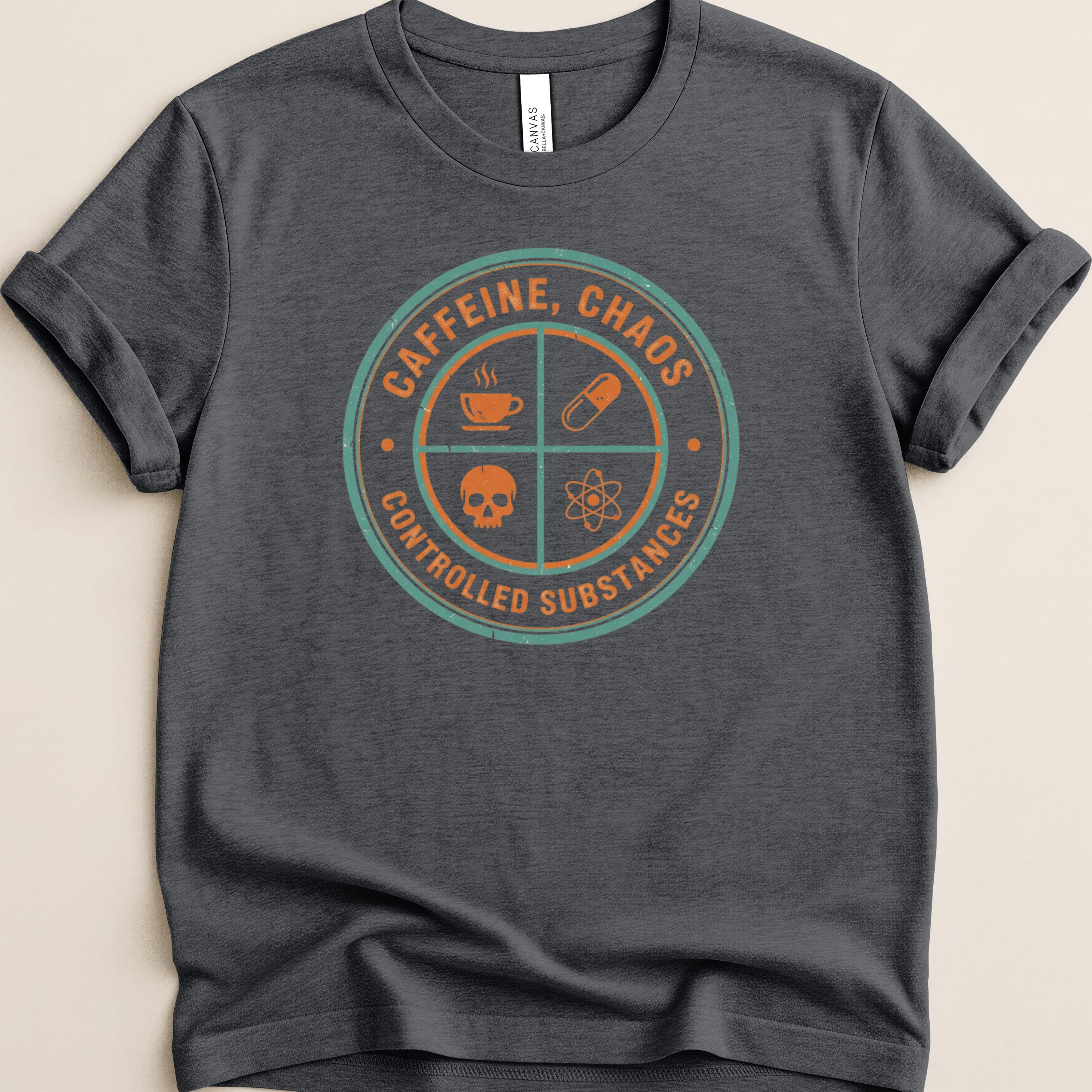T-shirt with "Caffeine, Chaos, Controlled Substances" text and science symbols.