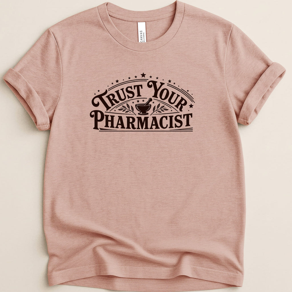 Pink t-shirt with "Trust Your Pharmacist" text and mortar and pestle graphic.