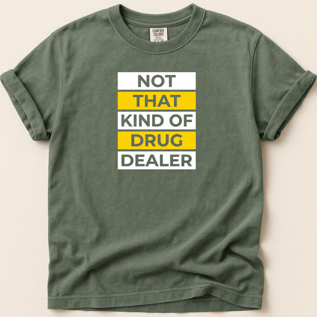 Green t-shirt with "NOT THAT KIND OF DRUG DEALER" text in white and yellow.