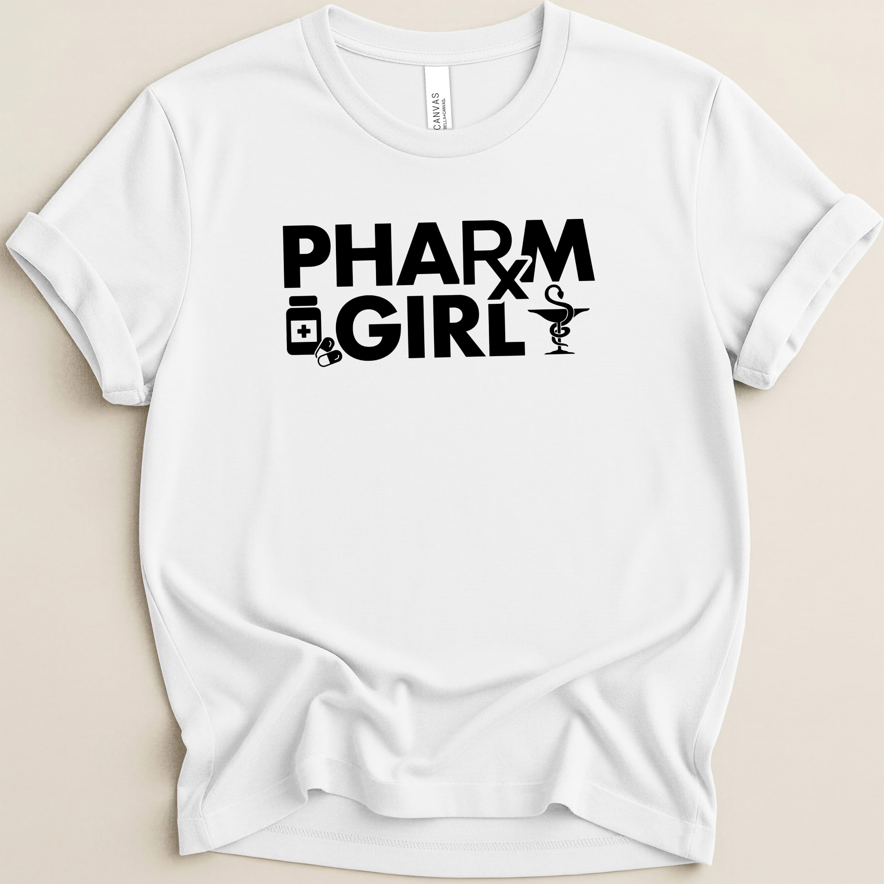 White t-shirt with black text "PHARM GIRL" and medical symbols.