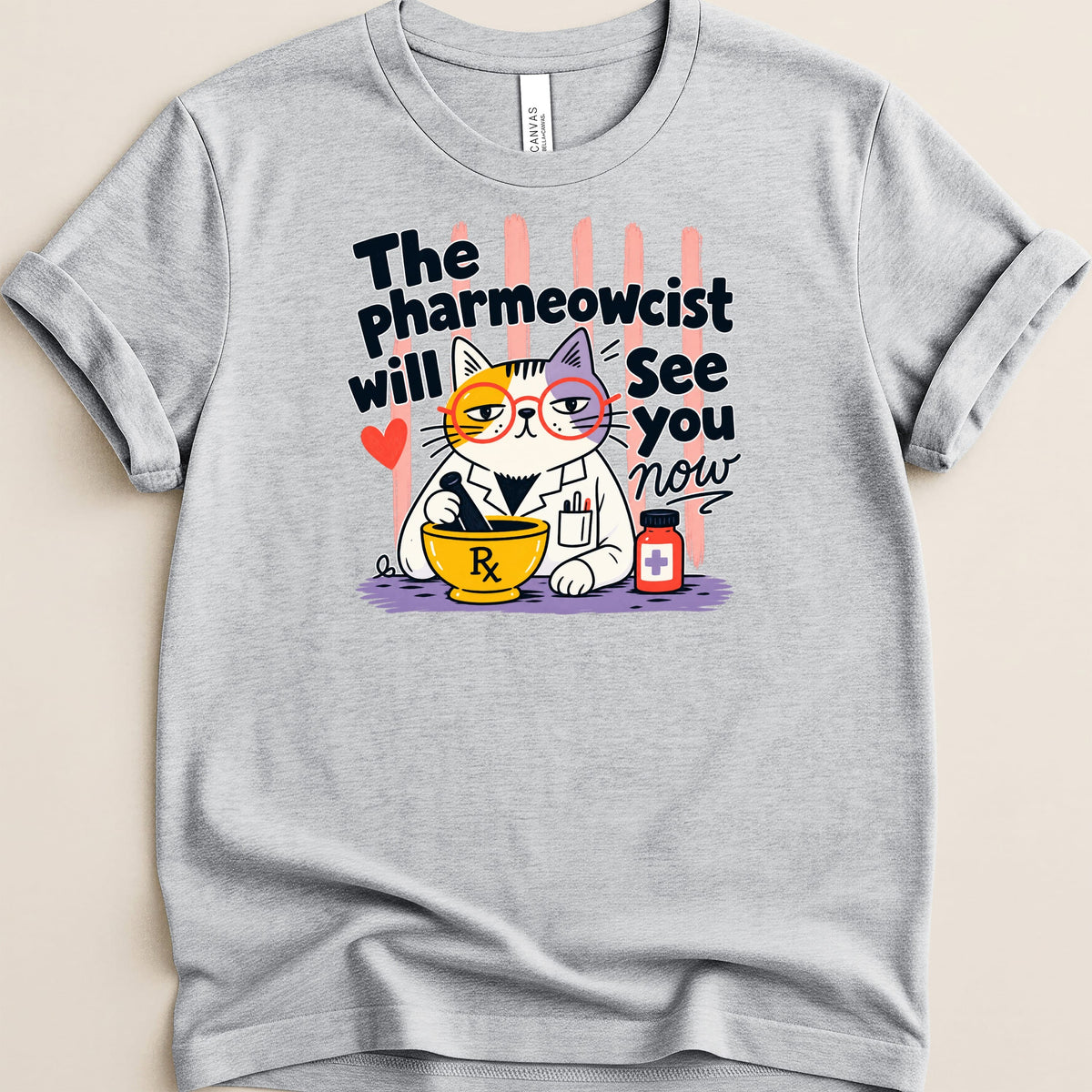 Grey t-shirt with a cartoon cat pharmacist text "The Pharmeowcist will See you now".