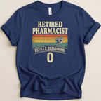 Navy t-shirt with "Retired Pharmacist" and "Refills Remaining: 0" text.