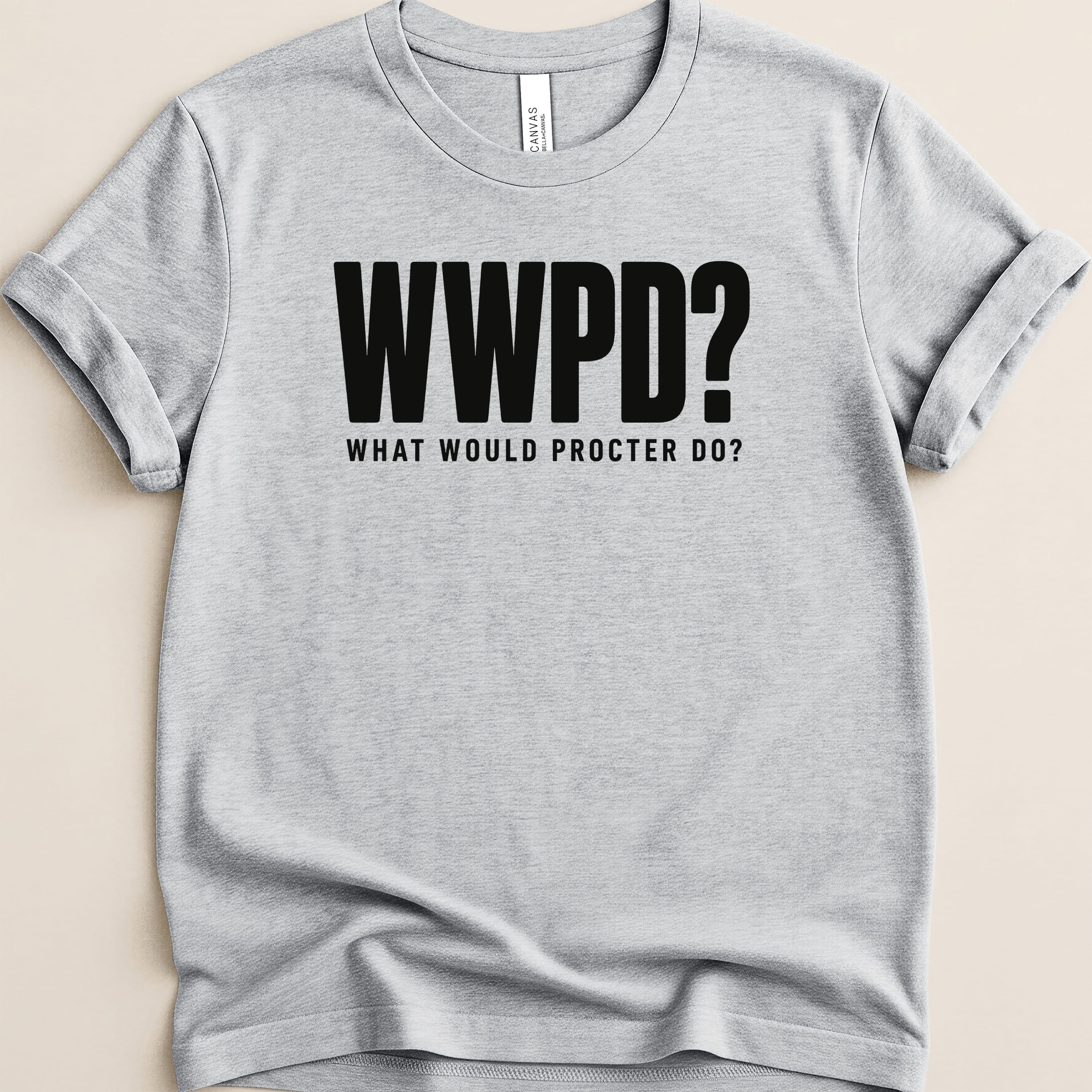 Gray t-shirt with black text "WWPD? WHAT WOULD PROCTER DO?".