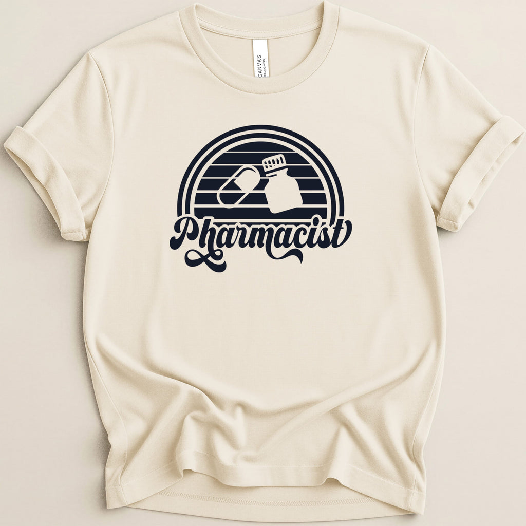 Cream t-shirt with "Pharmacist" text and pill bottle graphic.