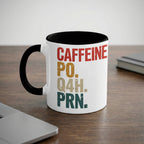 White mug with black rim and handle, features text "CAFFEINE PO. Q4H. PRN."