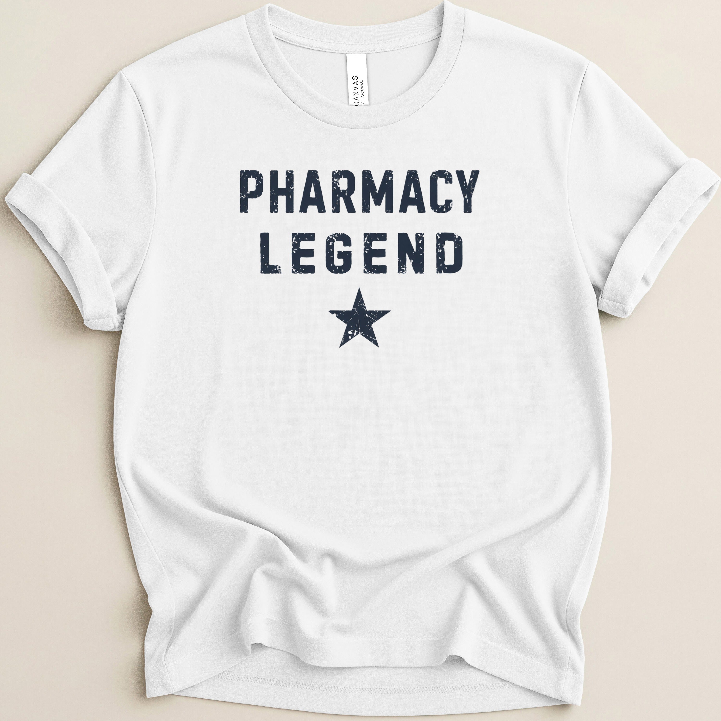 White t-shirt with "Pharmacy Legend" and a star in navy blue distressed print.