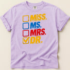 Purple t-shirt with "Miss", "Ms.", "Mrs.", and "Dr." text boxes, with a checkmark by "Dr."