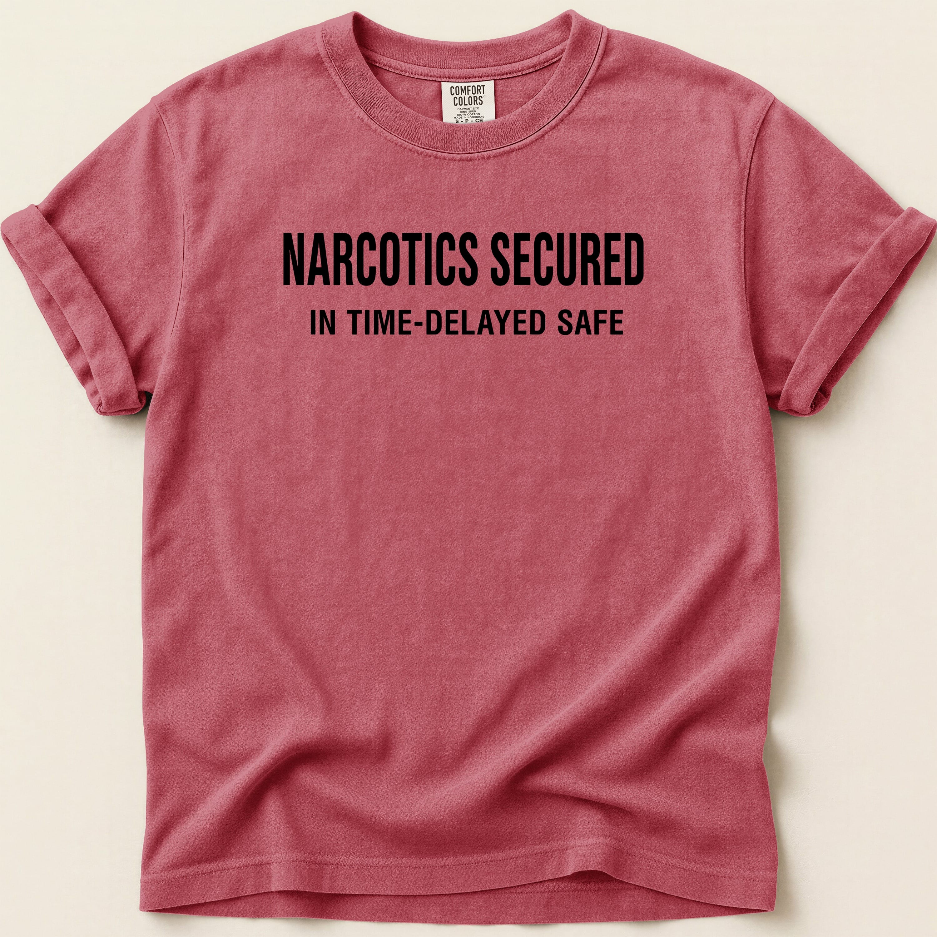 Comfort Colors t-shirt with "NARCOTICS SECURED IN TIME-DELAYED SAFE" text.