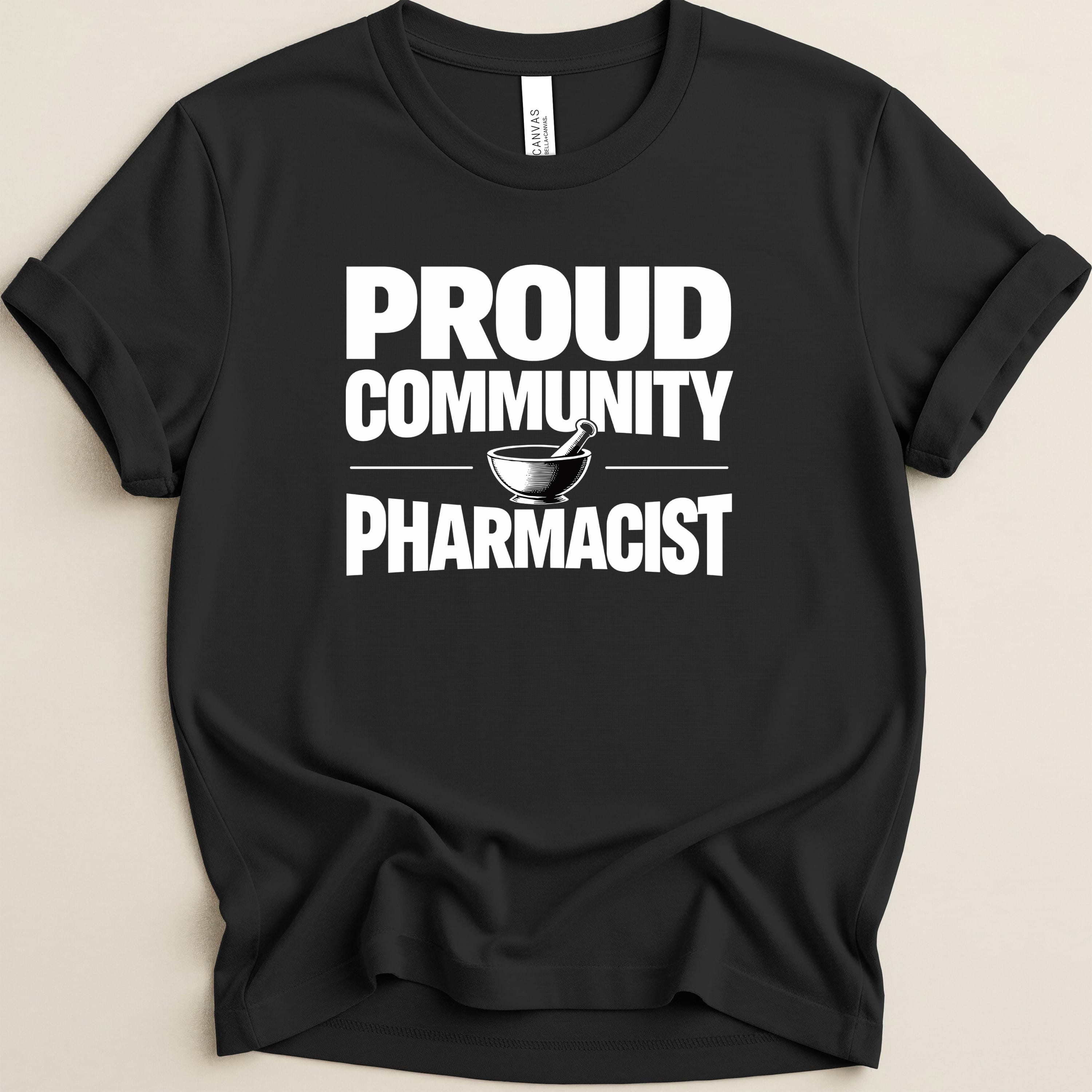 Black t-shirt with "Proud Community Pharmacist" and a mortar and pestle graphic.