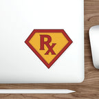 Red "Rx" symbol on a yellow and red shield sticker on a laptop.