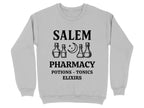 Salem Pharmacy potions and elixirs text on gray sweatshirt.