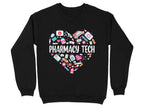 Black sweatshirt with a heart-shaped collage of medical icons and "Pharmacy Tech" text.