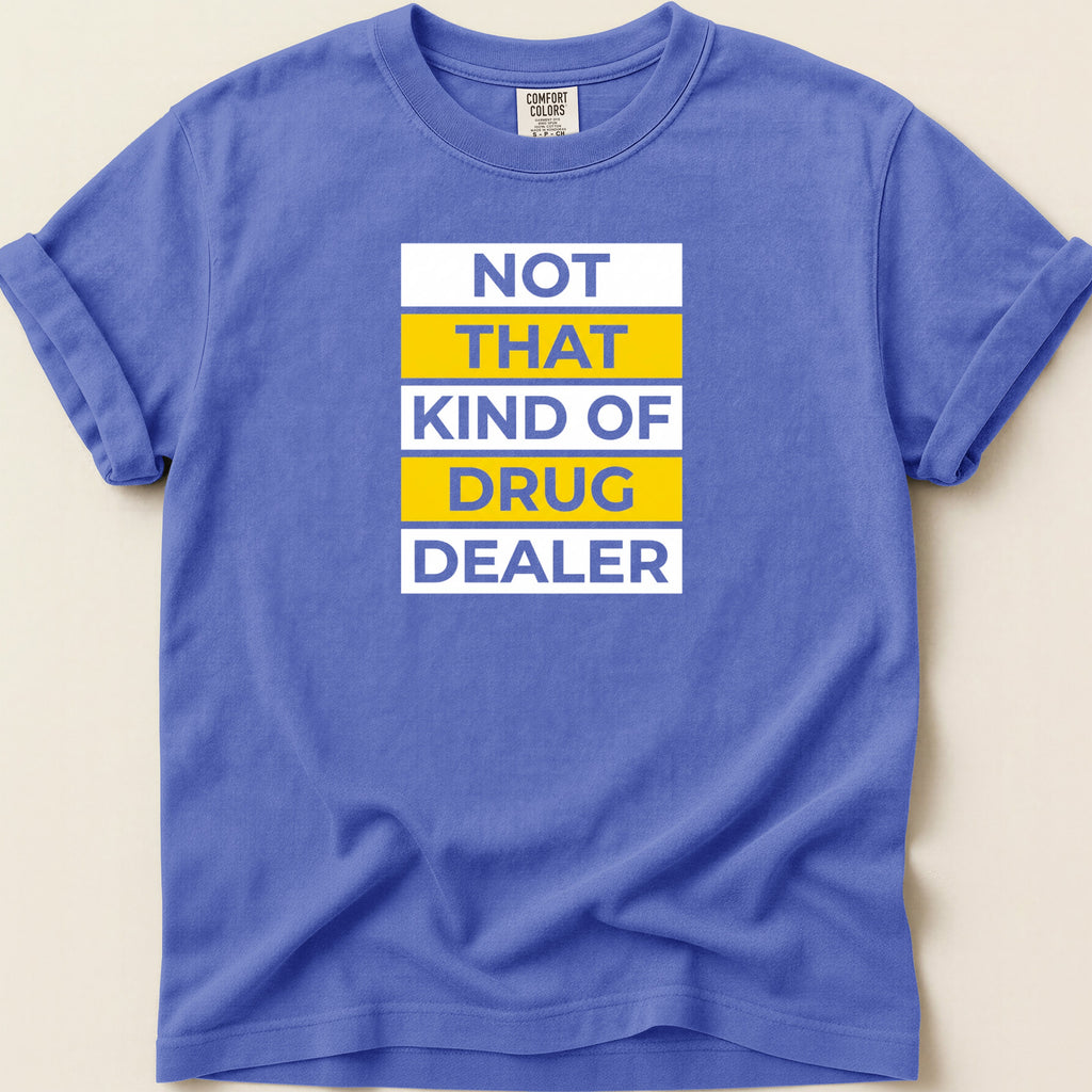 Purple t-shirt with "NOT THAT KIND OF DRUG DEALER" in yellow and white text.