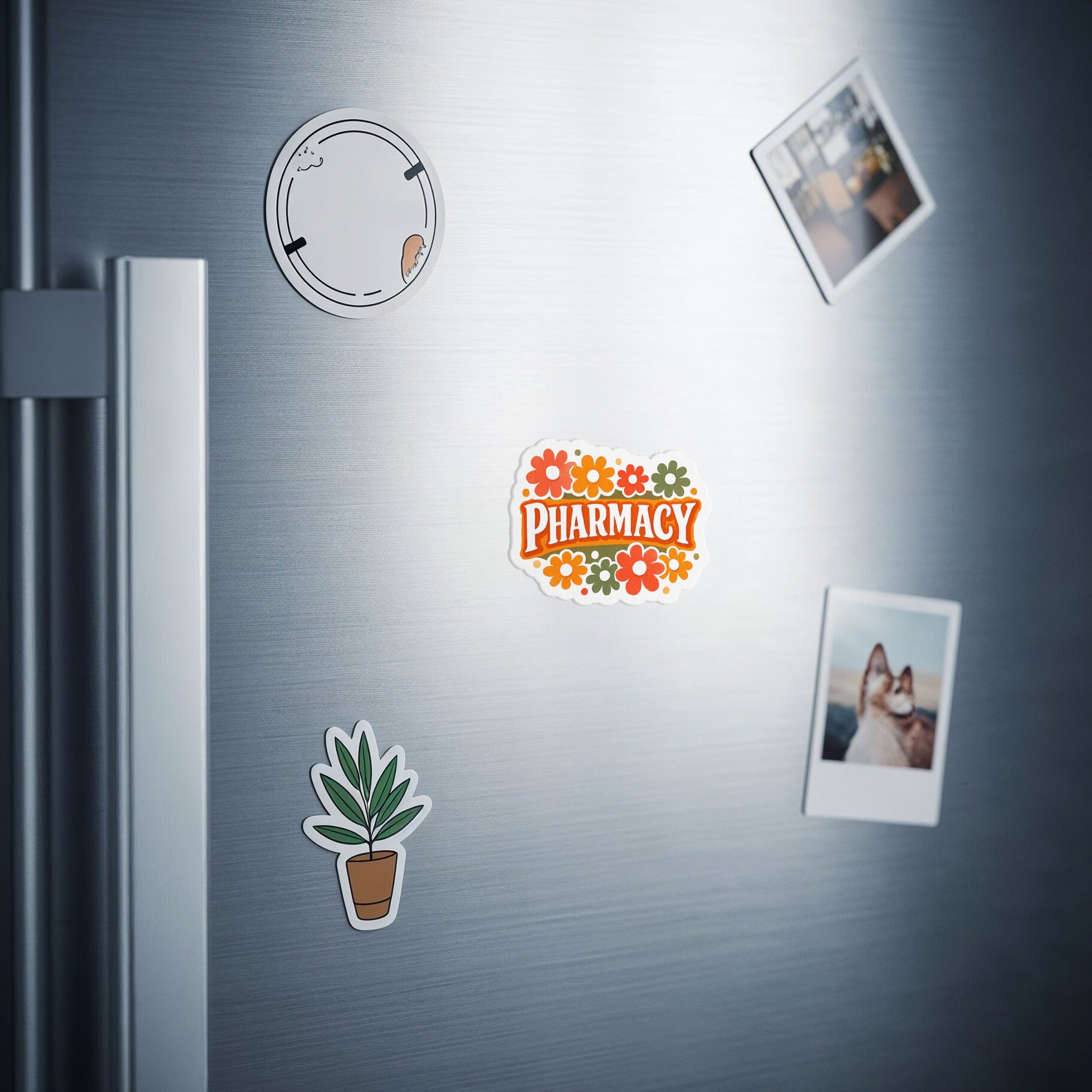 Sticker with "Pharmacy" in colorful flowers and small potted plant on refrigerator.