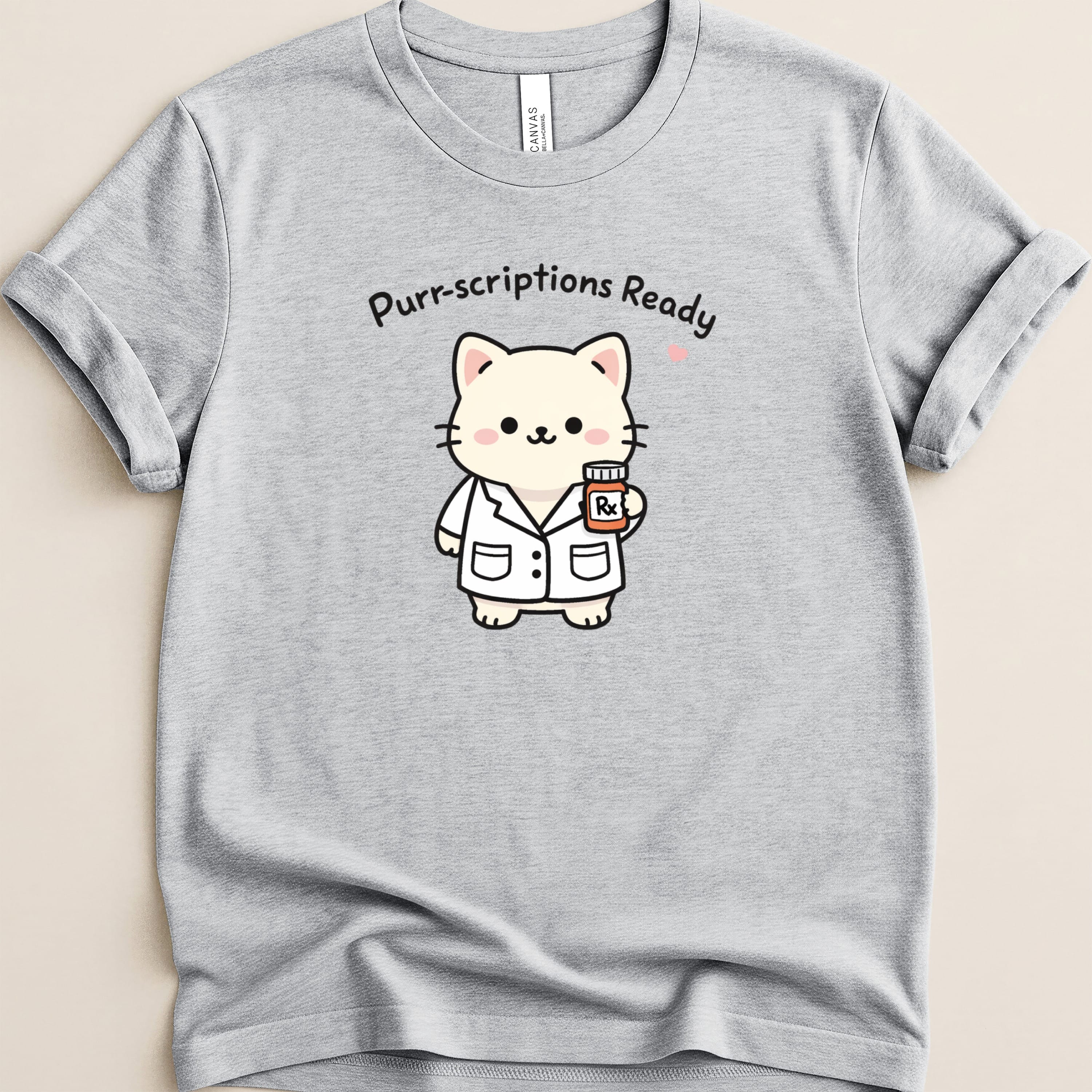 Gray t-shirt with white cartoon cat in lab coat holding Rx bottle.