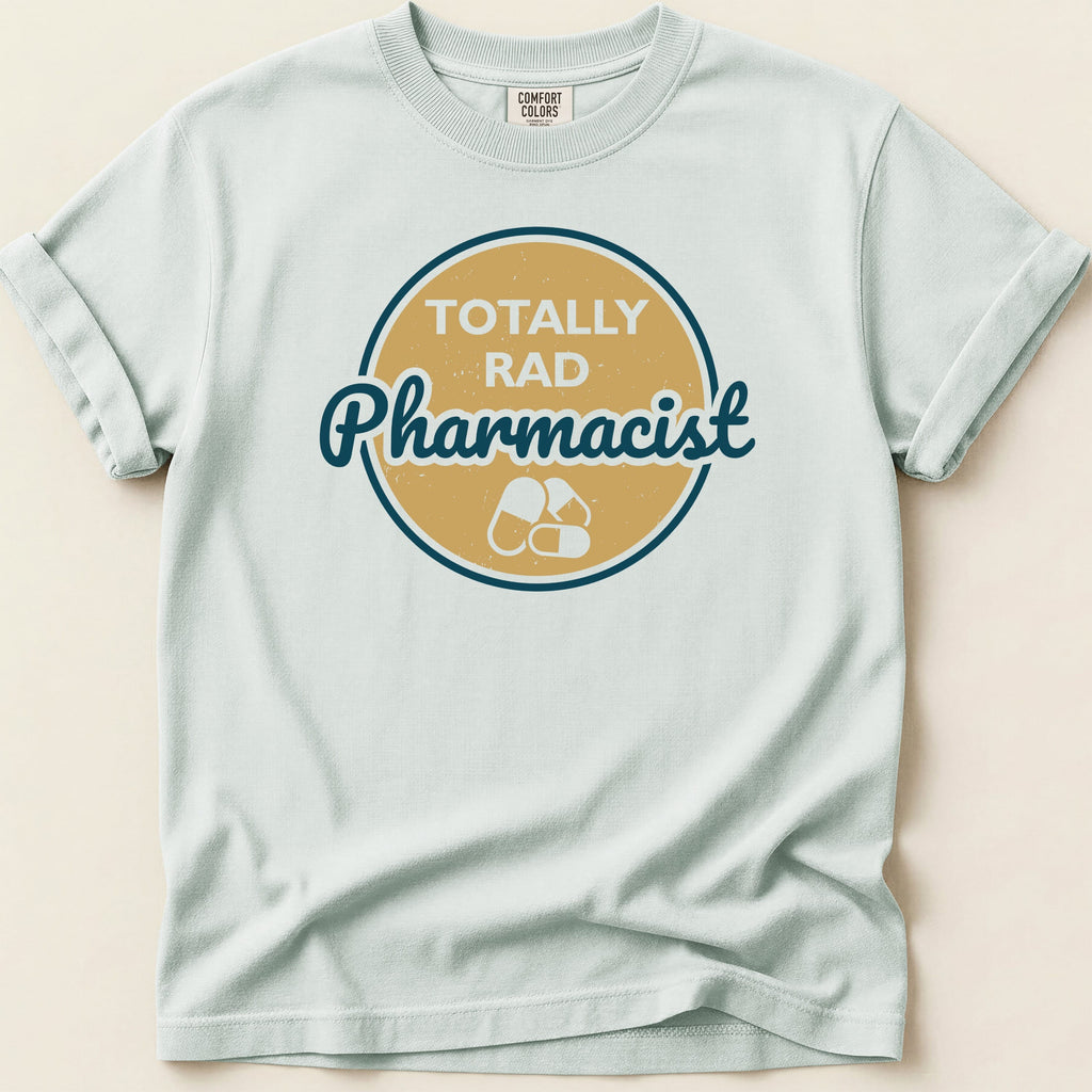 Light blue t-shirt with "Totally Rad Pharmacist" and capsule graphic.