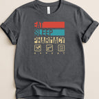 T-shirt with "Eat Sleep Pharmacy Repeat" text and pharmacy symbols.