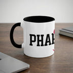 White mug with black rim and handle, "PHARM" text.