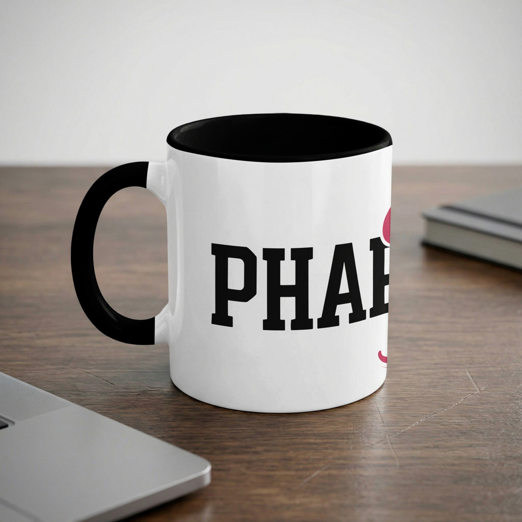 White mug with black rim and handle, "PHARM" text.