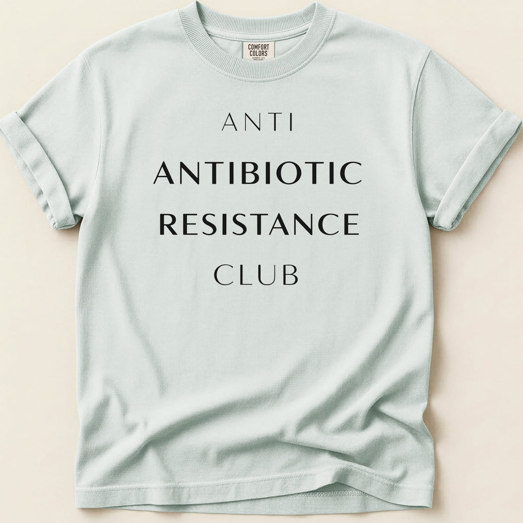 Light blue Comfort Colors t-shirt with "ANTI ANTIBIOTIC RESISTANCE CLUB" text.