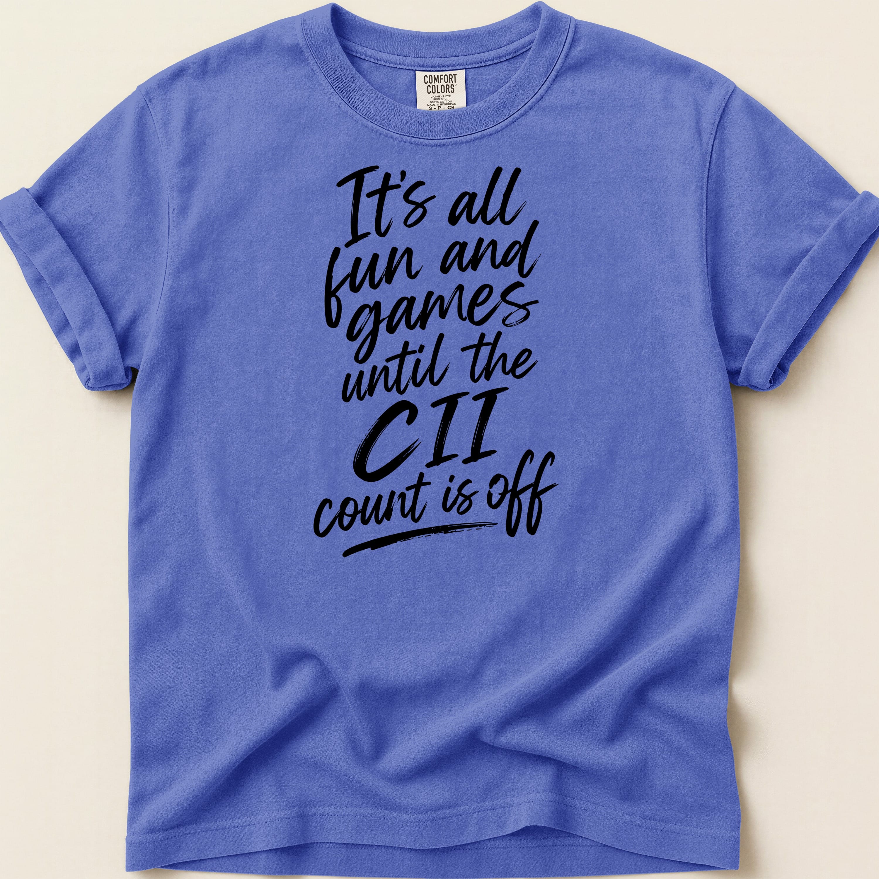 Purple Comfort Colors t-shirt with "It's all fun and games until the CII count is off" text.