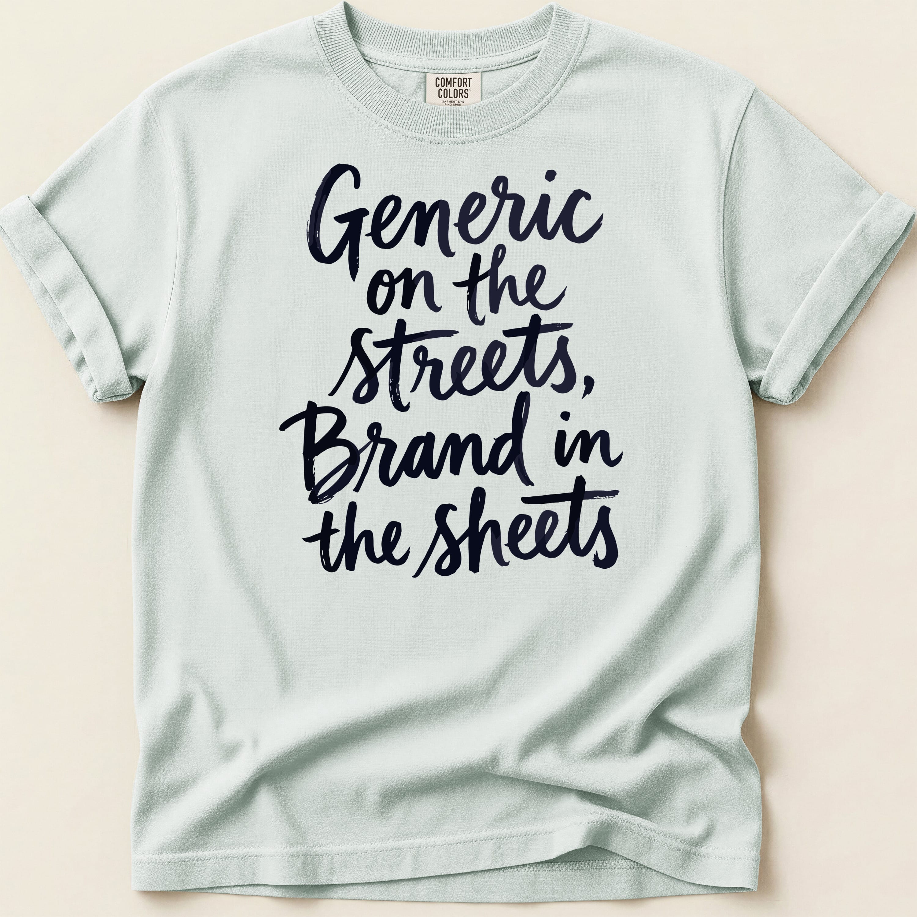 Light blue t-shirt with navy blue text "Generic on the streets, Brand in the sheets".