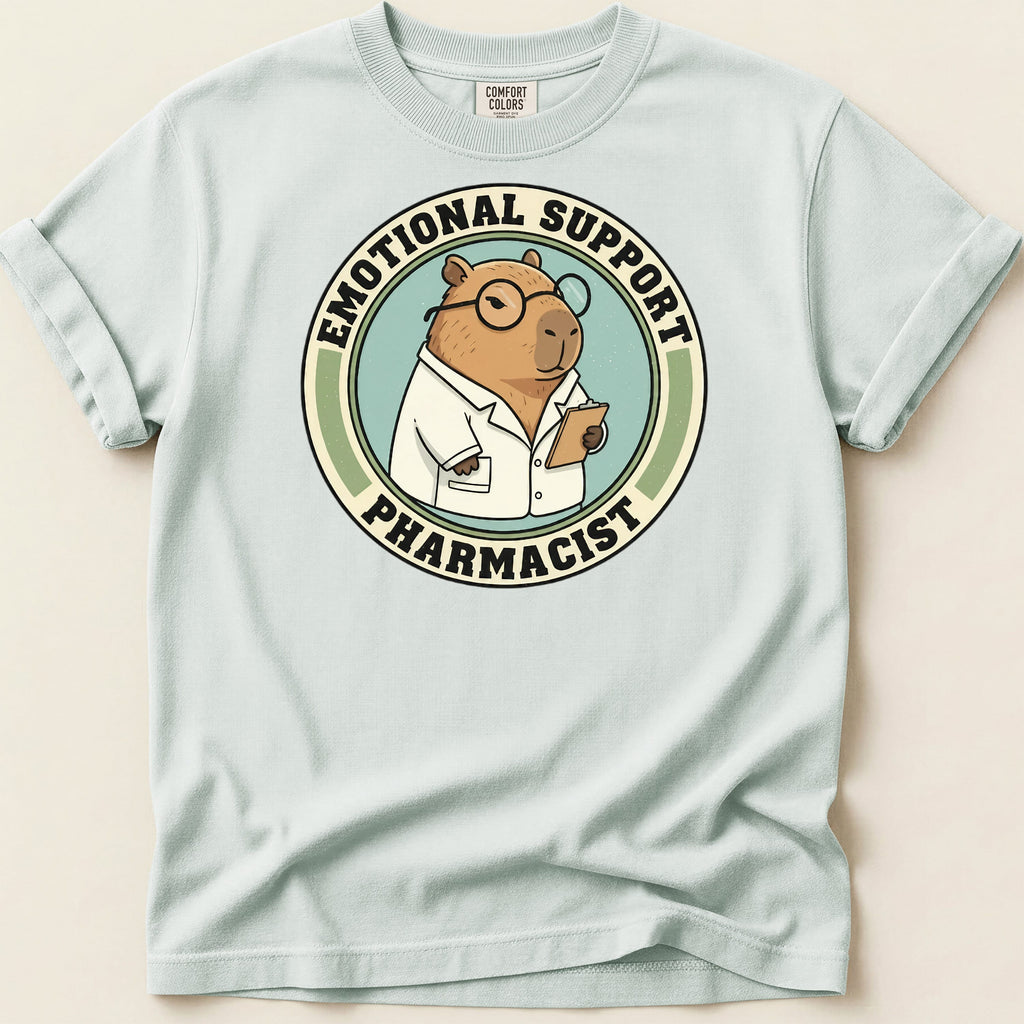 EMOTIONAL SUPPORT PHARMACIST graphic on a light blue t-shirt.