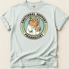 EMOTIONAL SUPPORT PHARMACIST graphic on a light blue t-shirt.