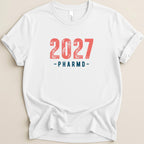 White t-shirt with "2027 PHARMD" in red and blue text.