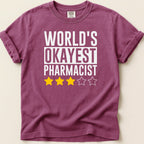 Maroon t-shirt with "WORLD'S OKAYEST PHARMACIST" and three yellow stars.