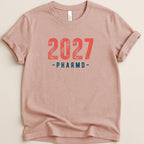 Pink t-shirt with "2027 PHARMD" text in red.
